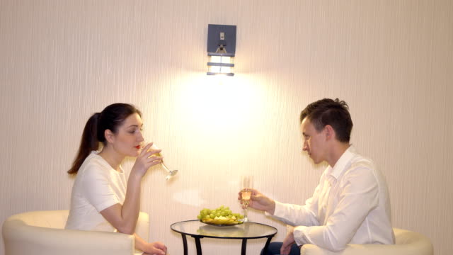 Romantic-rendezvous-of-a-man-and-a-woman-with-fruits-and-champagne