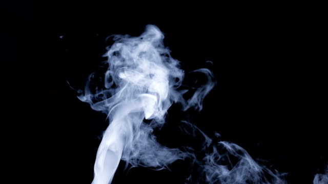 white-smoke-isolated-on-dark-screen