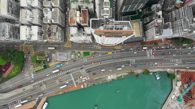 day-time-city-downtown-park-traffic-road-junction-aerial-topdown-panorama-4k-hong-kong