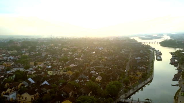 upper-view-calm-river-divides-ancient-town-Hoian