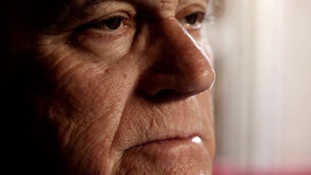 Worried,sad-old-man-face:-close-up-footage-of-retired-sad-old-man