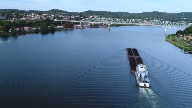 High-Angle-Wide-Establishing-Shot-of-Coal-Barge-on-Ohio-River