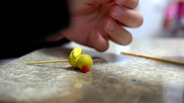 A-child-playing-with-clay.