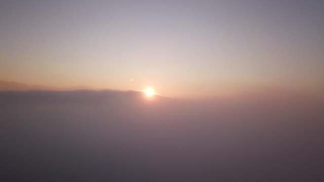 Fly-Through-Cloud-Sunrise