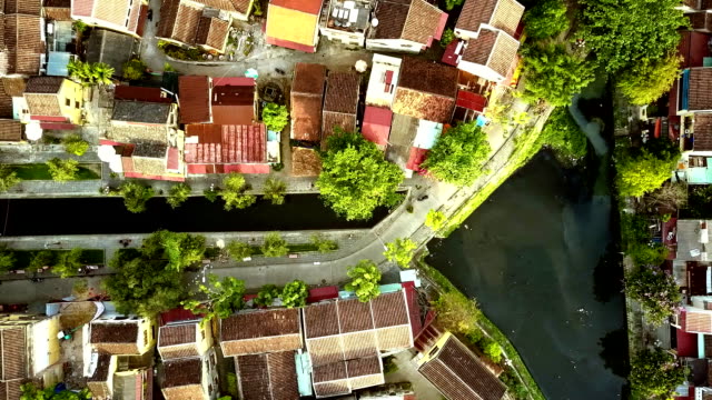 flight-over-colorful-roofs-along-channel-crossing-quarter