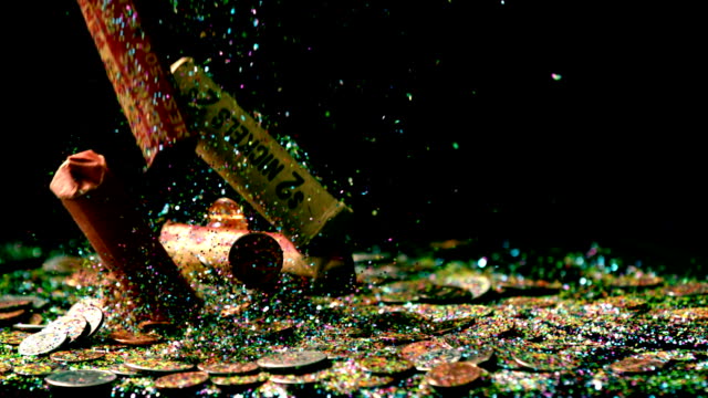 slow-motion-falling-coin-rolls-and-confetti
