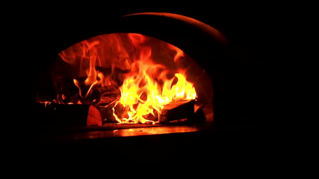 Beautiful-Fire-Close-Up-Slow-Motion.-Video-Clip-of-Burning-Firewood-in-the-Fireplace.-Firewood-Burn-in-the-wood-burning-stove.-30fps-Full-HD