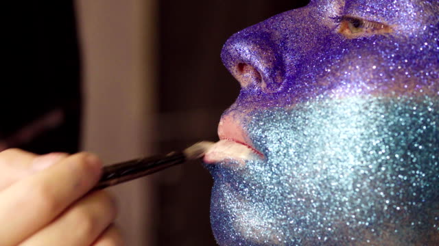 Face-art.-The-make-up-artist-applying-foundation