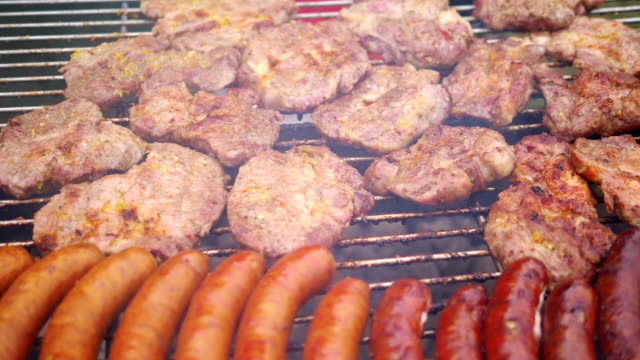 Sausages-and-pork-on-the-grill-in-slow-motion-180fps