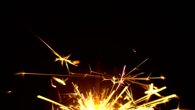 Yellow-Sparklers-is-Sparkling-On-Black-Background-Bottom-2