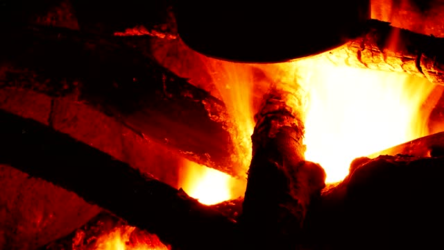 Timelapse-of-campfire-in-4K.-Tourist-kettle-above-a-fire.