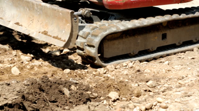 Excavator-working-on-street