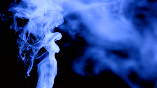 blue-vapor-on-the-black-background,-slow-motion