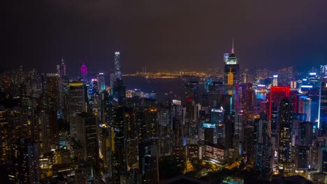 noche-iluminación-puerto-ciudad-antena-timelapse-panorama-4k-hong-kong
