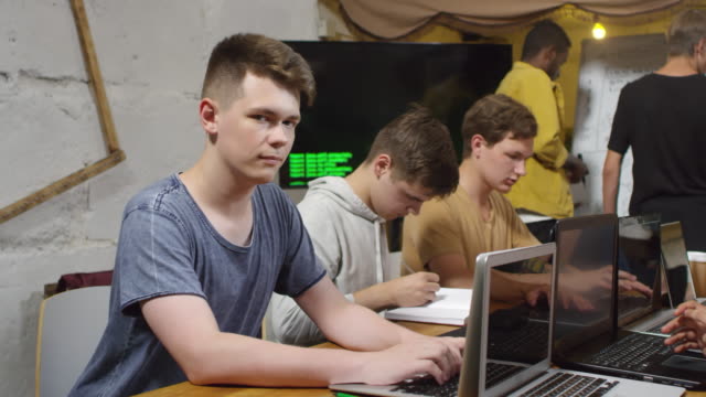 Portrait-of-Man-Studying-in-Coding-Class