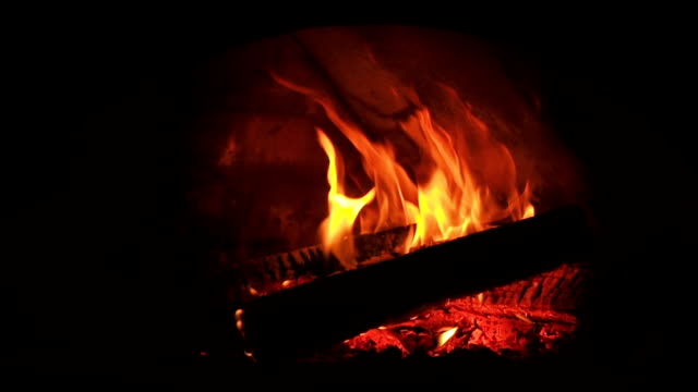 Furnace-fire.-Video-clip-of-burning-firewood-in-the-fireplace.-Firewood-burn-in-the-oven.-30fps-Full-HD