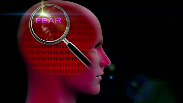 animation---profile-of-a-man-with-close-up-of-magnifying-glass-on-word-
FEAR