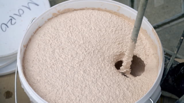 mixing-of-material-for-facade-plastering