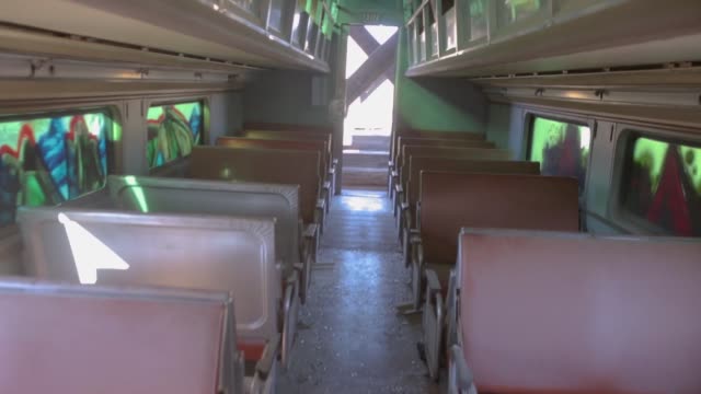 Interior-of-abandoned-train-walking-camera-shake