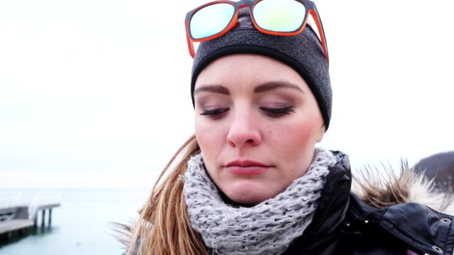 Woman-sad-cry-face-expression-outdoor-on-cold-day-4K