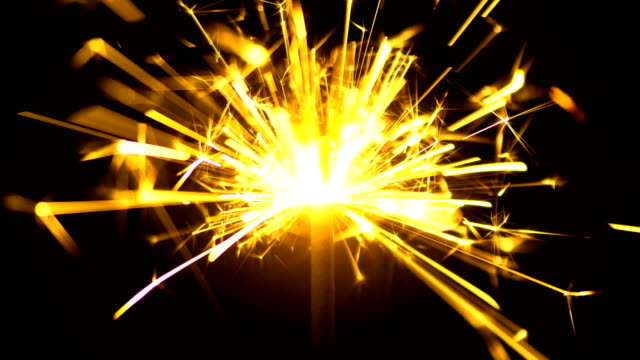 Yellow-Sparklers-is-Sparkling-On-Black-Background-Close-Up