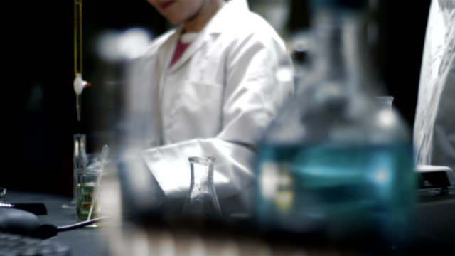 Close-up-shot-of-chemistry-equipment-set-up-on-a-laboratory-table
