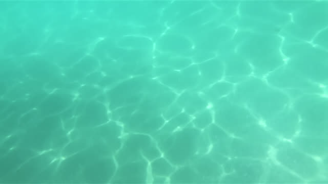 Slow-Motion-Under-Water-Sun-light-Reflection