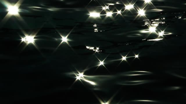 Sea-Sparks-On-Water-Reflection
