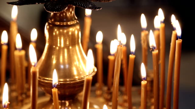 Candles-burn-in-the-church