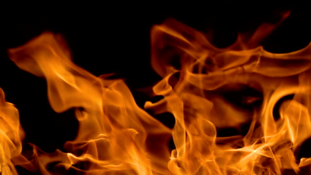 Flames-of-fire-on-black-background-in-slow-motion