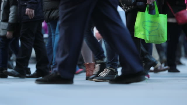 Legs-of-Crowd-People-Walking-on-the-Street.-Close-up-of-Crowd-feet-in-120fps