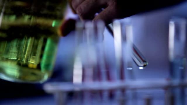 Close-up-of-experiments-being-conducted-in-a-chemistry-lab