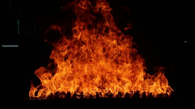 Closeup-of-flames-burning-on-black-background