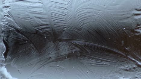 Cold-make-pattern-on-the-window-glass-from-the-water-time-lapse