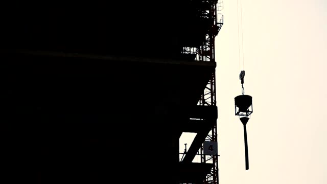 Tower-crane-on-the-construction-site-buildings-are-lifting-up-high
