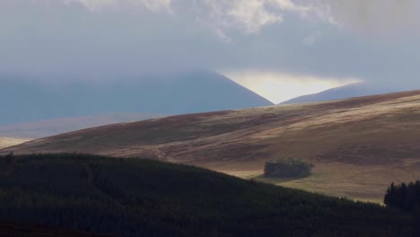 Scottish-mountain-scene-of-glen-during-stormy-weather-in-the-cairngorms-NP-during-October,-autumn.