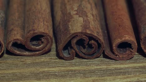 cinnamon-sticks-on-a-wooden-table.-4k