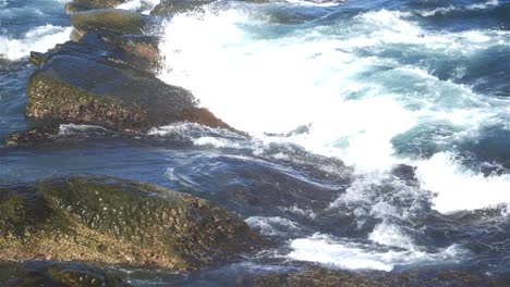 Foaming-and-splashing-wave-in-the-Ocean-with-slow-motion-style,-Sunny-Day-in-Chaojing-Park,-Keelung-City-Taiwan