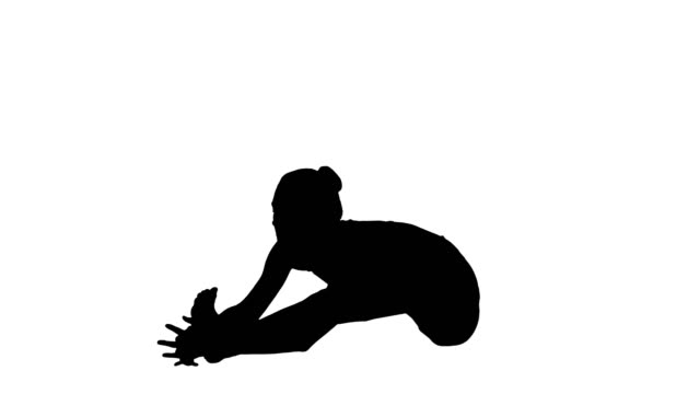 Silhouette-Young-attractive-woman-practicing-yoga,-sitting-in-Head-to-Knee-Forward-Bend-exercise,-Janu-Sirsasana-pose