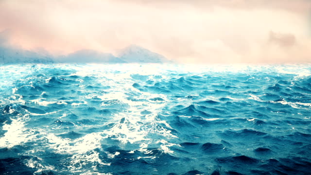 Qualitativ-hochwertige-Animation-Meereswellen-mit-wunderschönen-Bergen-im-Hintergrund.-Looping.