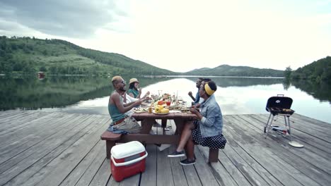 Sitting-at-Table-with-Friends