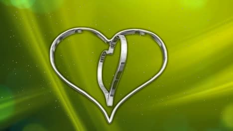 Fondo-movimiento-con-corazones-plata-giratorio-sobre-un-fondo-verde