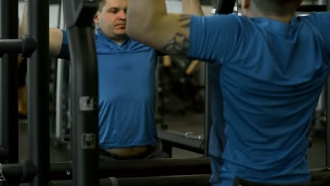 Paraplegic-Man-Hanging-on-Bar-in-Gym