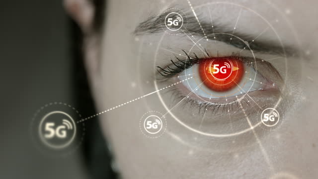 Young-cyborg-female-blinks-then-high-speed-5G-symbols-appears.