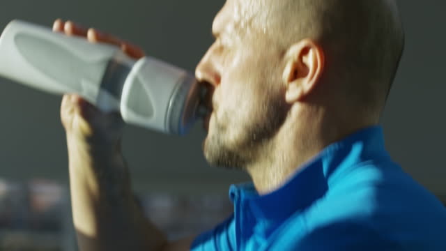 Mature-Man-Drinking-Water