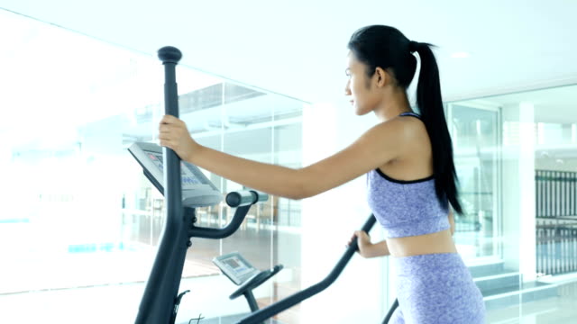 Asian-woman-Exercise-at-gym.-Sport-and-Reaction-concept.-4k-Resolution.