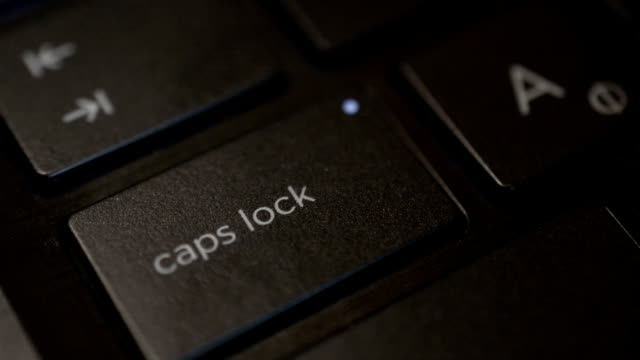 Videoaufnahmen-von-menschlichen-Finger-Drücken-einer-Taste-Caps-Lock