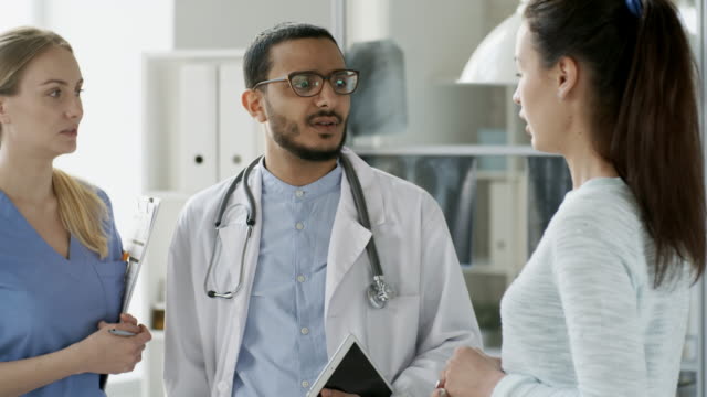 Patient-Asking-Questions-to-Two-Doctors