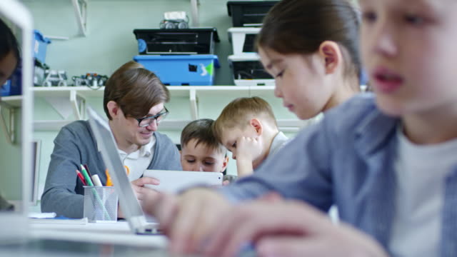 Schoolchildren-Using-Gadgets-in-IT-Class