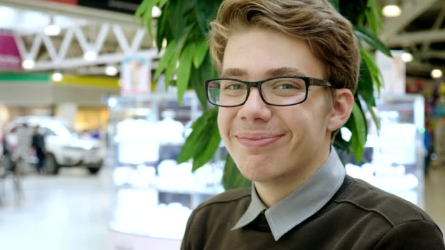 Portrait-of-a-young-man-in-a-mall.